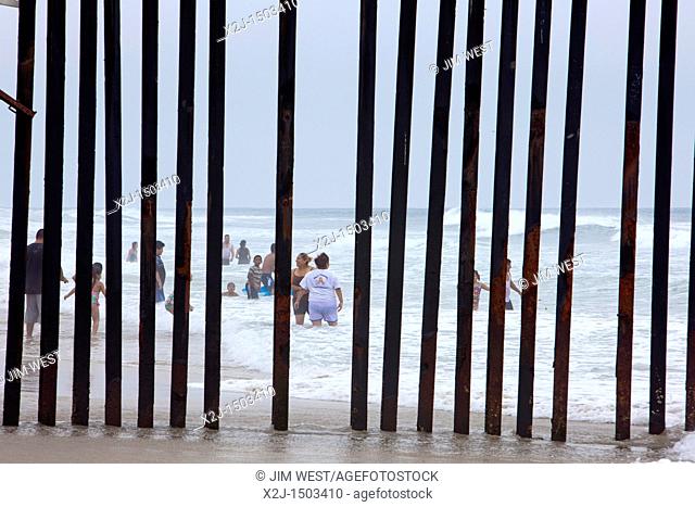 San Ysidro, California - A fence at California's Border Field State Park separates the United States and Mexico on a beach at the Pacific Ocean  Across the...