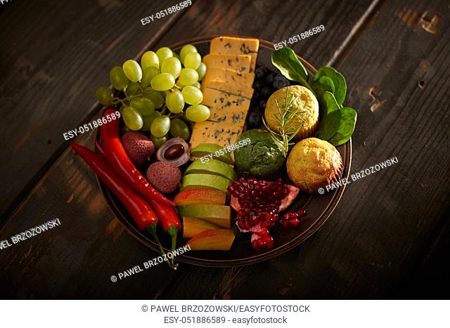 Healthy snacks on wooden background
