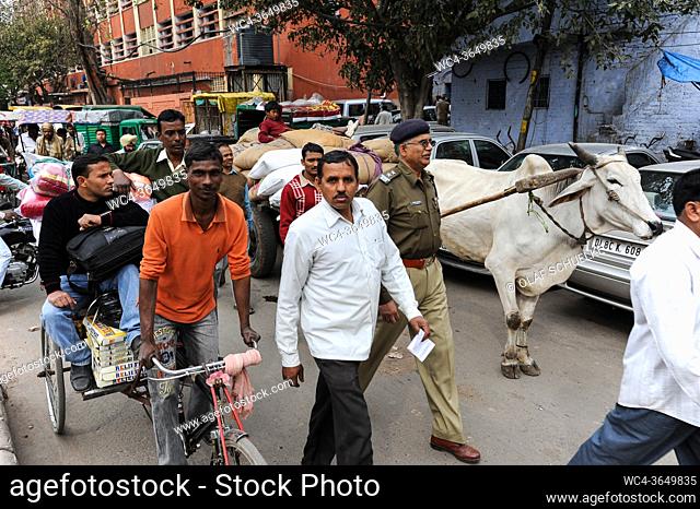 Delhi, India, Asia - Hustle and bustle with crowds of people during rush hour on a busy street near the New Delhi Railway Station in the centre of the Indian...