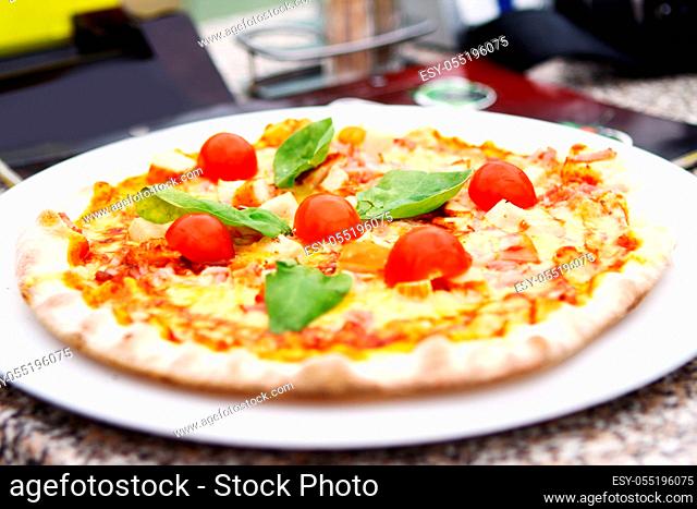 Hot and tasty pizza on the plate