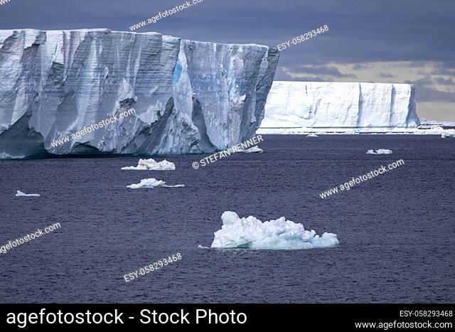 Huge icebergs floating in cold sea in Antarctica