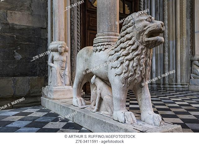Sculptures supporting columns in front of the southern portal of the Basilica of Santa Maria Maggiore. Upper Town (Città Alta), Bergamo, Lombardy, Italy, Europe