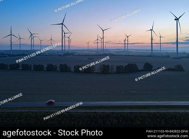 03 November 2021, Brandenburg, Jacobsdorf: Morning atmosphere above the wind energy park ""Odervorland"" (aerial view with a drone)
