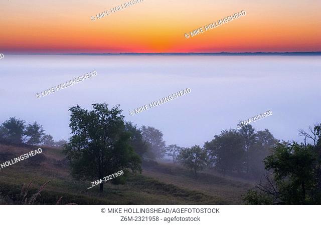 Low fog blankets the valleys in the Loess Hills of western Iowa, September 9, 2008. Moisture laden crops frequently produce thick ground fog on cool mornings...