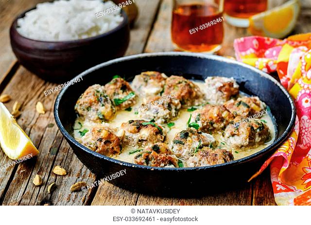 Moroccan lemon cardamom meatballs with rice. the toning. selective focus