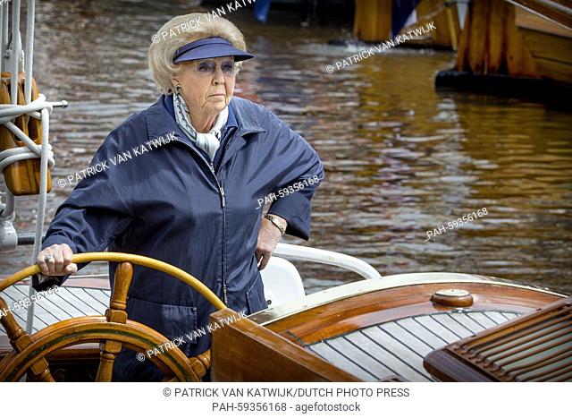 Princess Beatrix of The Netherlands sails on her ship De Groene Draeck during the fleet review of the jubilee foundation Stamboek Ronde & Platbodemjachten in...