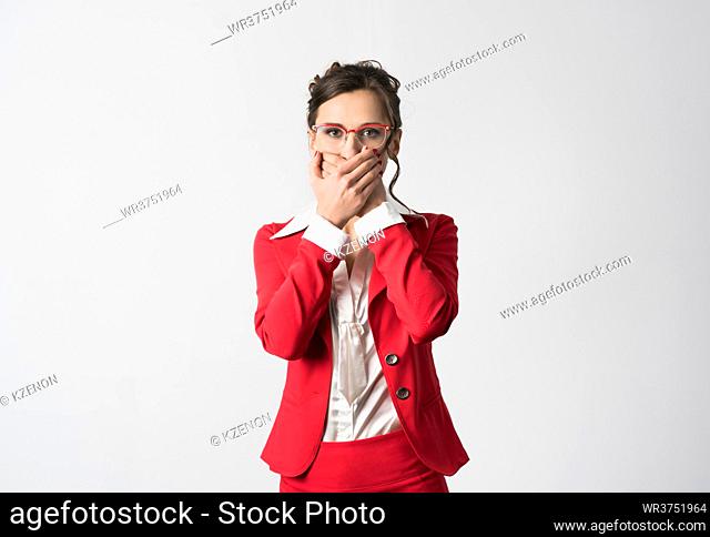 Businesswoman speak no evil covering her mouth