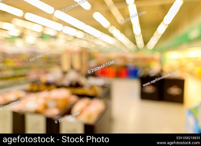 Portrait of defocused supermarket with retail store interior in the shopping mall