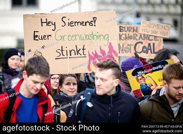 13 January 2020, Bavaria, Munich: During a Fridays for Future protest in front of the Siemens headquarters on Wittelsbacher Platz
