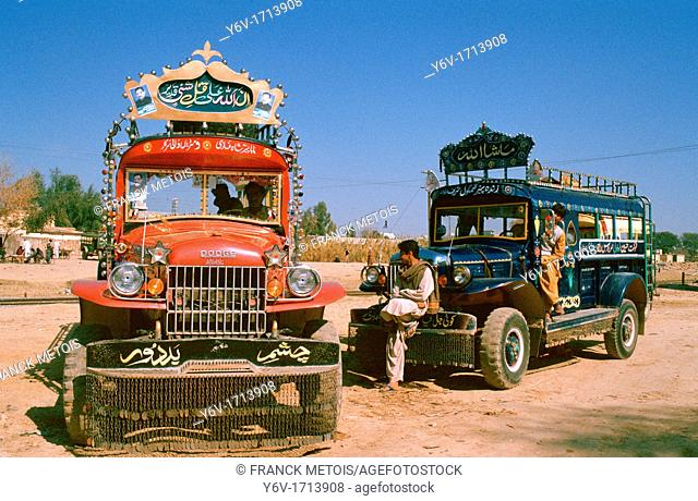 Bus drivers and helpers are waiting for passengers ( Pakistan)