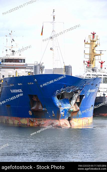 29 March 2022, Schleswig-Holstein, Kiel: The heavily bow-damaged ""Bjoerkoe"" lies on the quay of a building materials store