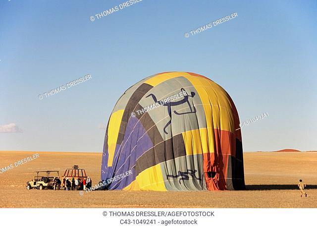 Namibia - After having landed, the hot-air ballonn quickly deflates  Namib Desert, NamibRand Nature Reserve, Namibia