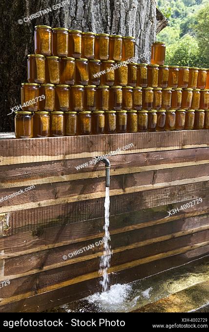 Comb honey pots display, Roadside stop, between Saranda and Gjirokaster, where local produce is sold, Albania, Southeastern Europe