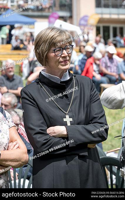 06 June 2022, Bavaria, Gerolfingen: Gisela Bornowski, regional bishop of Würzburg-Ansbach, follows Mission's ""One World to Recycle Cell Phones"" campaign at...