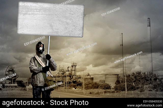 Stalker in gas mask with blank banner. Place for your text