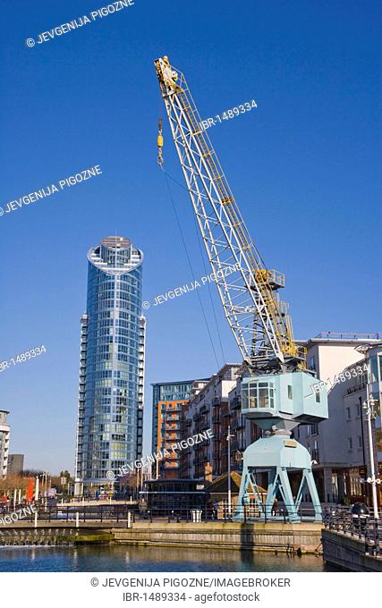 Dock Crane and The Number One Tower or Lipstick at back, Gunwharf Quays, Portsmouth, Hampshire, England, United Kingdom, Europe