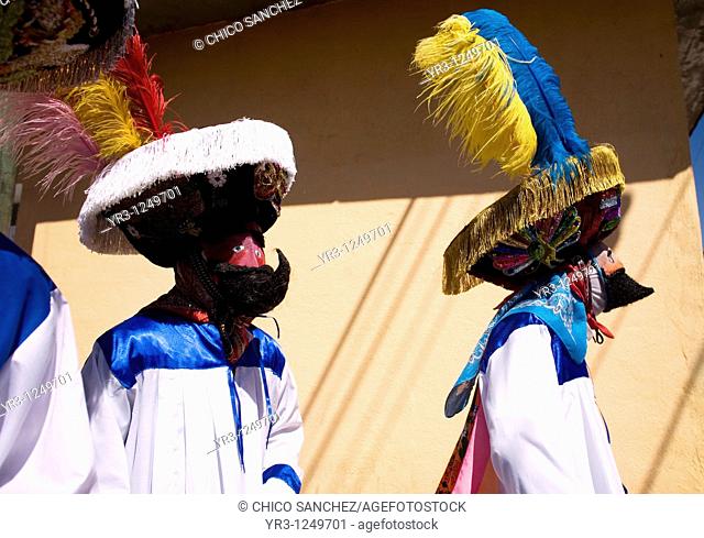 Chinelo dancers perform during carnival celebrations in Tlayacapan, Mexico. Groups of Chinelos dance the 'Brinco del Chinelo