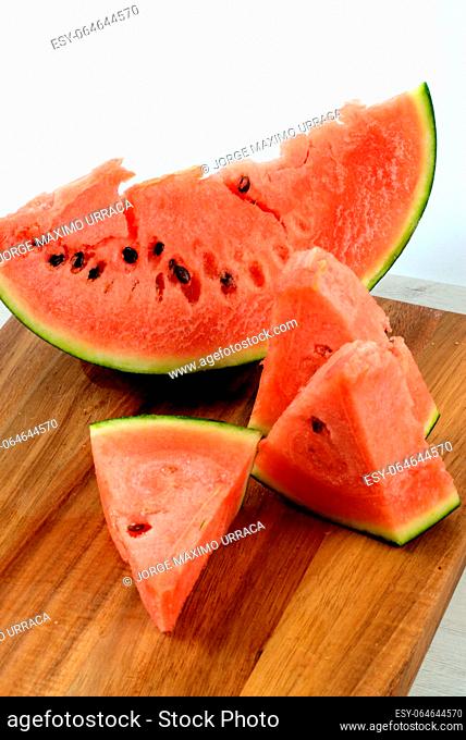 Freshly cut watermelon on a wooden board