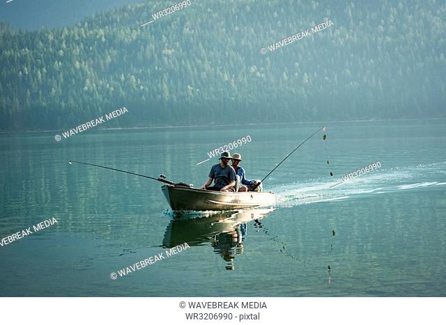 Two fishermen fishing in the river
