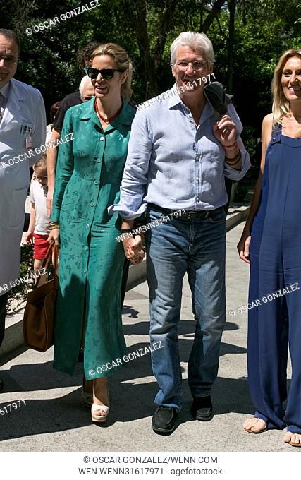 Richard Gere and Alejandra Silva attend the presentation of the charity project 'El Retiro invade el Nino Jesus' organised by the Juegaterapia Foundation at the...