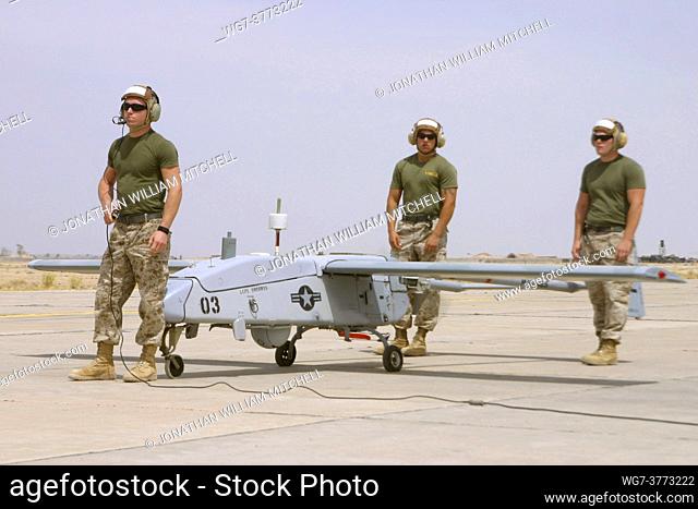 IRAQ Al Taqaddum -- 2006 -- US Marine Corpsl mechanics with Marine Unmanned Aerial Vehicle Squadron 2 prepare to launch their Pioneer unmanned aerial vehicle...