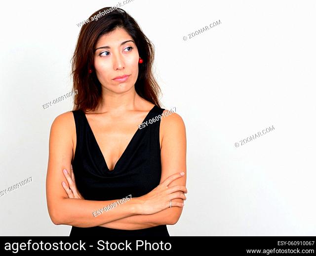 Studio shot of young beautiful woman against white background