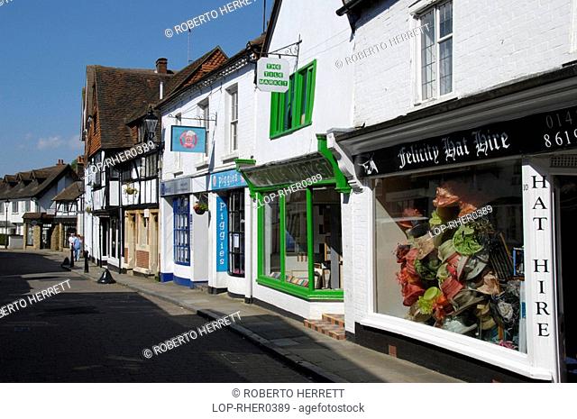 England, Surrey, Godalming, Shop fronts and old buildings on Church Street in Godalming