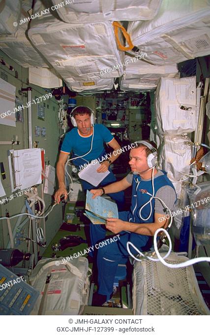 Early film documentation of the Expedition 1 crew members onboard the International Space Station (ISS) shows cosmonauts Sergei K