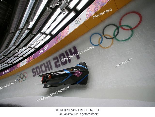 Pilot Cory Butner and Christopher Fogt of USa team 2 compete in the Two-man Heat 3 Bobsleigh event in Sliding Center Sanki at the Sochi 2014 Olympic Games