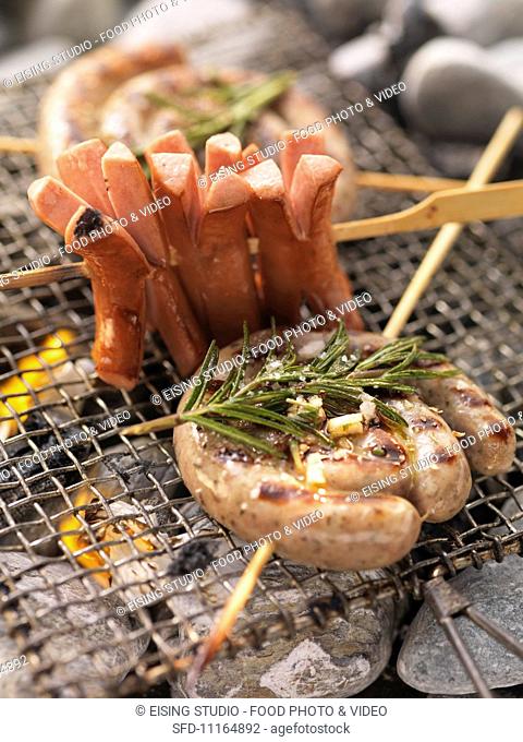 Barbecued sausage skewers on the barbecue