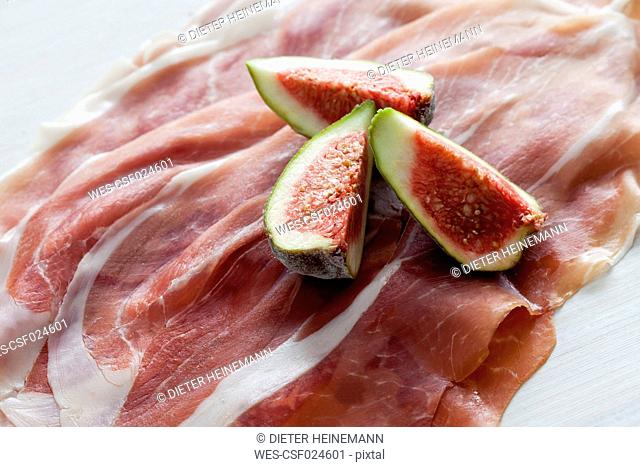 Parma ham and three slices of fig