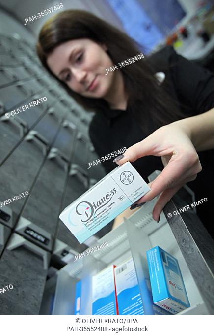 A pharmaceutical assistant holds a pack of the contraceptive Diane 35 in Luebbecke, Germany, 30 January 2013. The acne medicine by Bayer often prescribed as a...