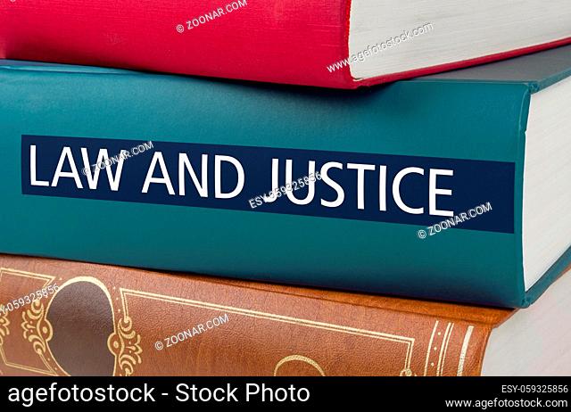 A book with the title Law and Justice written on the spine