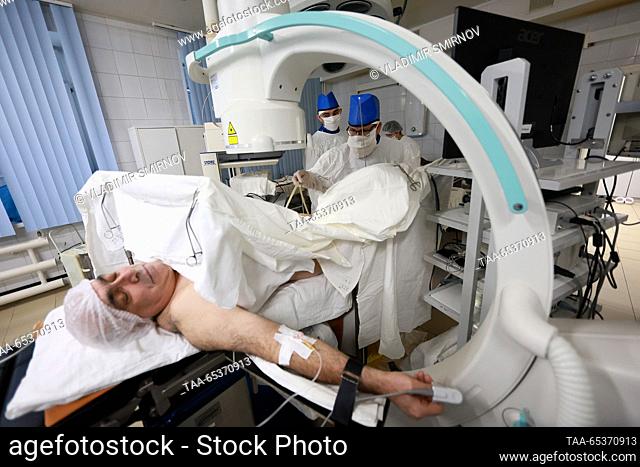 RUSSIA, IVANOVO - NOVEMBER 30, 2023: A patient undergoes a thulium fibre laser lithotripsy at the urology department of City Clinical Hospital No 7