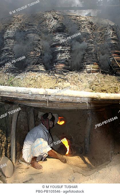 A craftsman burns claywares Bogra, Bangladesh October 2008