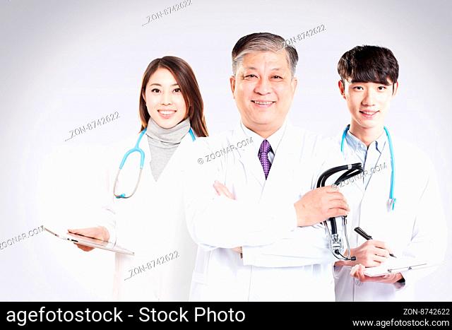 three Asian surgery doctors in hospital