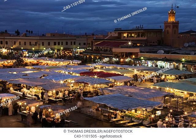 Morocco - Food stalls at Djemaa El Fna, Marrakesh's famous and sensuous square  At dusk