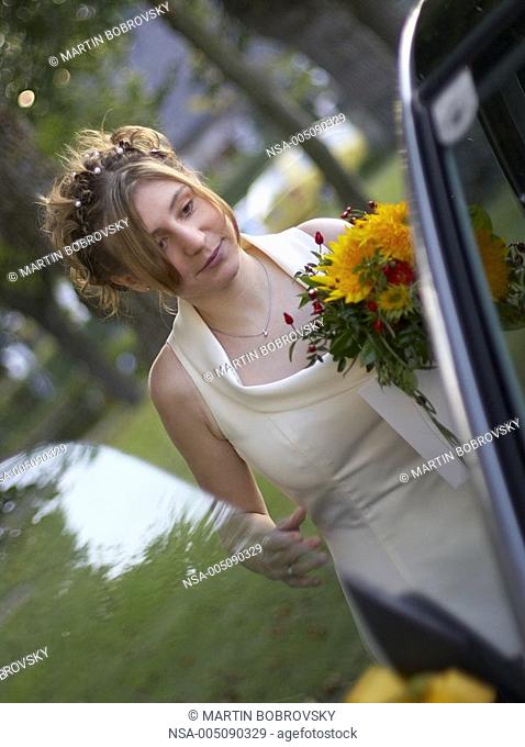 bride entering the car