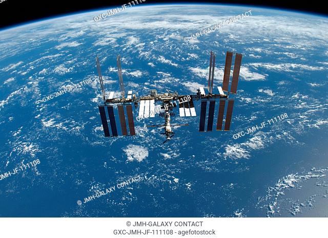 This is one of a series of images featuring the International Space Station photographed soon after the space shuttle Atlantis and the station began their...