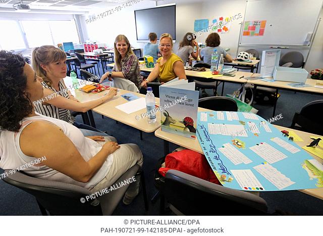 13 June 2019, Berlin: Women sit in a seminar room and take part in a German lesson. They didn't all study to become teachers, but something else
