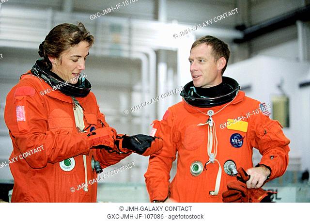 Astronauts Heidemarie M. Stefanyshyn-Piper (left) and Christopher J. Ferguson, STS-115 mission specialist and pilot, respectively