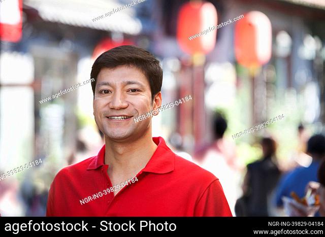 Portrait of Mid Adult Man in Nanluoguxiang, Beijing