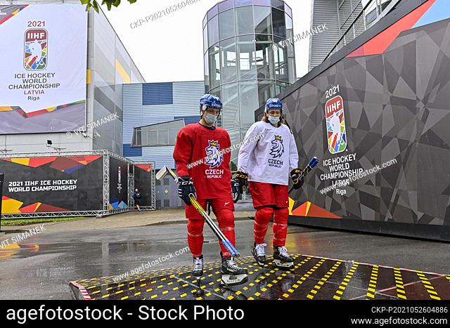 David Sklenicka, left, and Libor Sulak of Czech Republic on the way to a bus that will take them to the training hall during the 2021 IIHF Ice Hockey World...