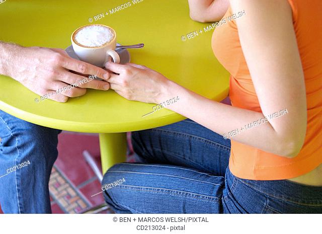 Couple drinking coffee (details)