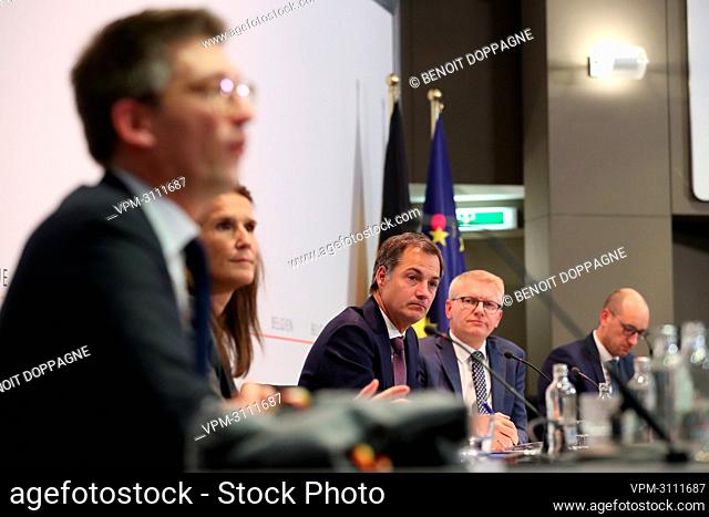 Foreign Affairs Minister Sophie Wilmes, Prime Minister Alexander De Croo and Vice-prime minister and Mobility Minister Georges Gilkinet pictured at a press...