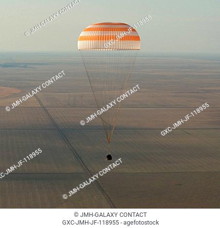 The Soyuz TMA-04M spacecraft is seen as it lands with Expedition 32 Commander Gennady Padalka of Russia, NASA Flight Engineer Joe Acaba and Russian Flight...