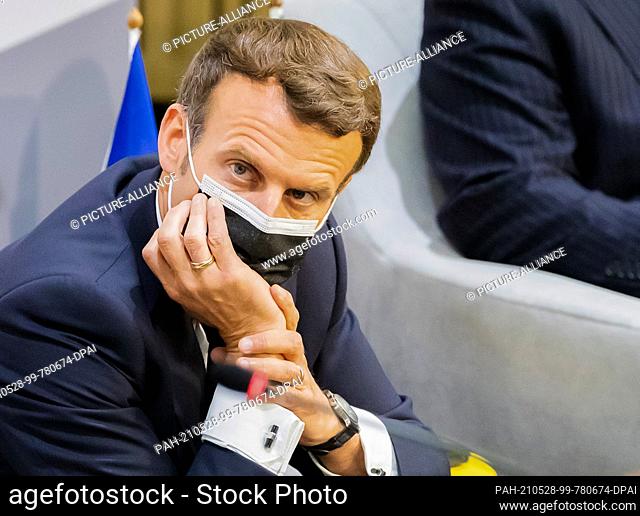 28 May 2021, South Africa, Pretoria: Emmanuel Macron, President of France, attends the launch meeting of the Initiative for the Future of Vaccines in Africa at...