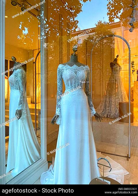 Wedding dresses in a shop window. Madrid, Spain
