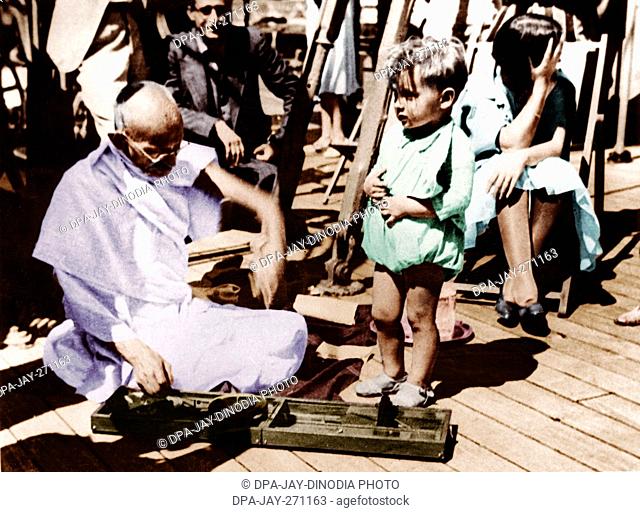 Mahatma Gandhi spinning on sundeck on board of S S Rajputana, India, Asia, September 1931