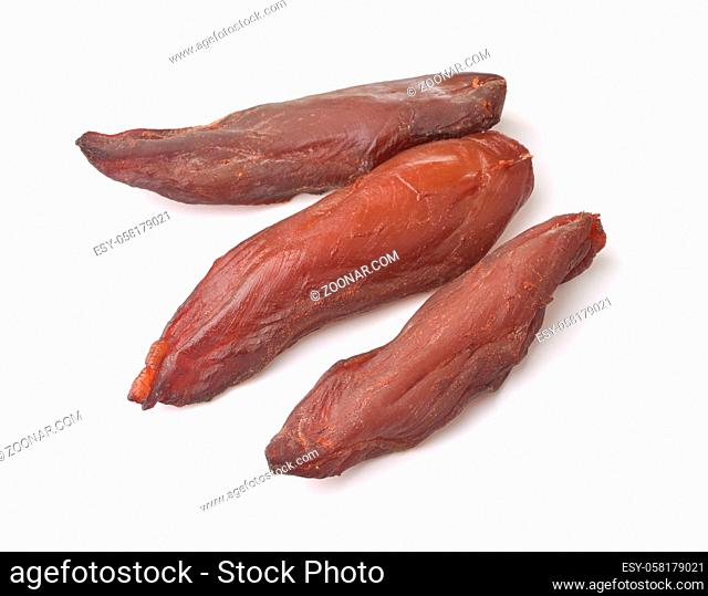 Three whole pieces of smoked meat isolated on white